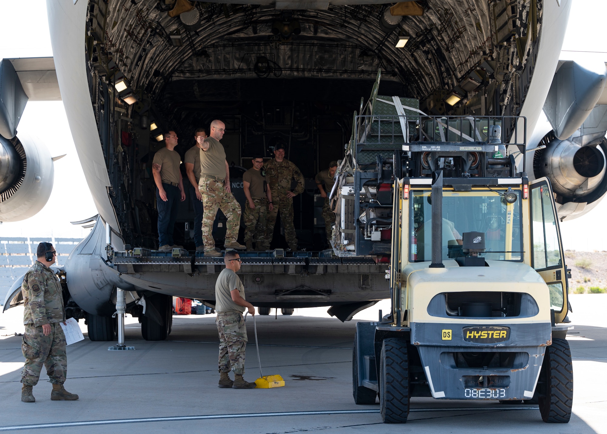 Crews from Morris Air National Guard Base and the 107th Airlift Wing work together to load a C-17 with tools and spare parts needed for the mission. The 162nd Logistics Readiness Squadron coordinated the round trip movement of all equipment and personnel to Naval Air Station Key West. (U.S. Air National Guard photo by Maj. Angela Walz)