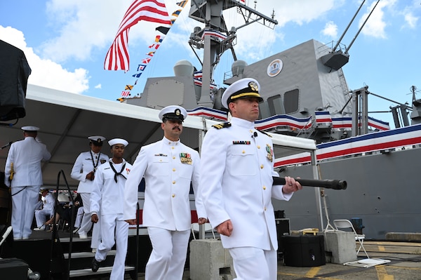 Sailors march during the commissioning of the Navy’s newest Arleigh Burke-class guided-missile destroyer USS Frank E. Petersen Jr. (DDG 121) in Charleston, S.C., May 14, 2022.