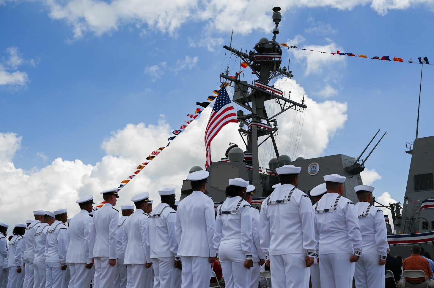Sailors stand at attention during the commissioning of the Navy’s newest Arleigh Burke-class guided-missile destroyer USS Frank E. Petersen Jr. (DDG 121) in Charleston, S.C., May 14, 2022.