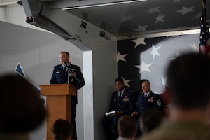 Photo of Airman at podium