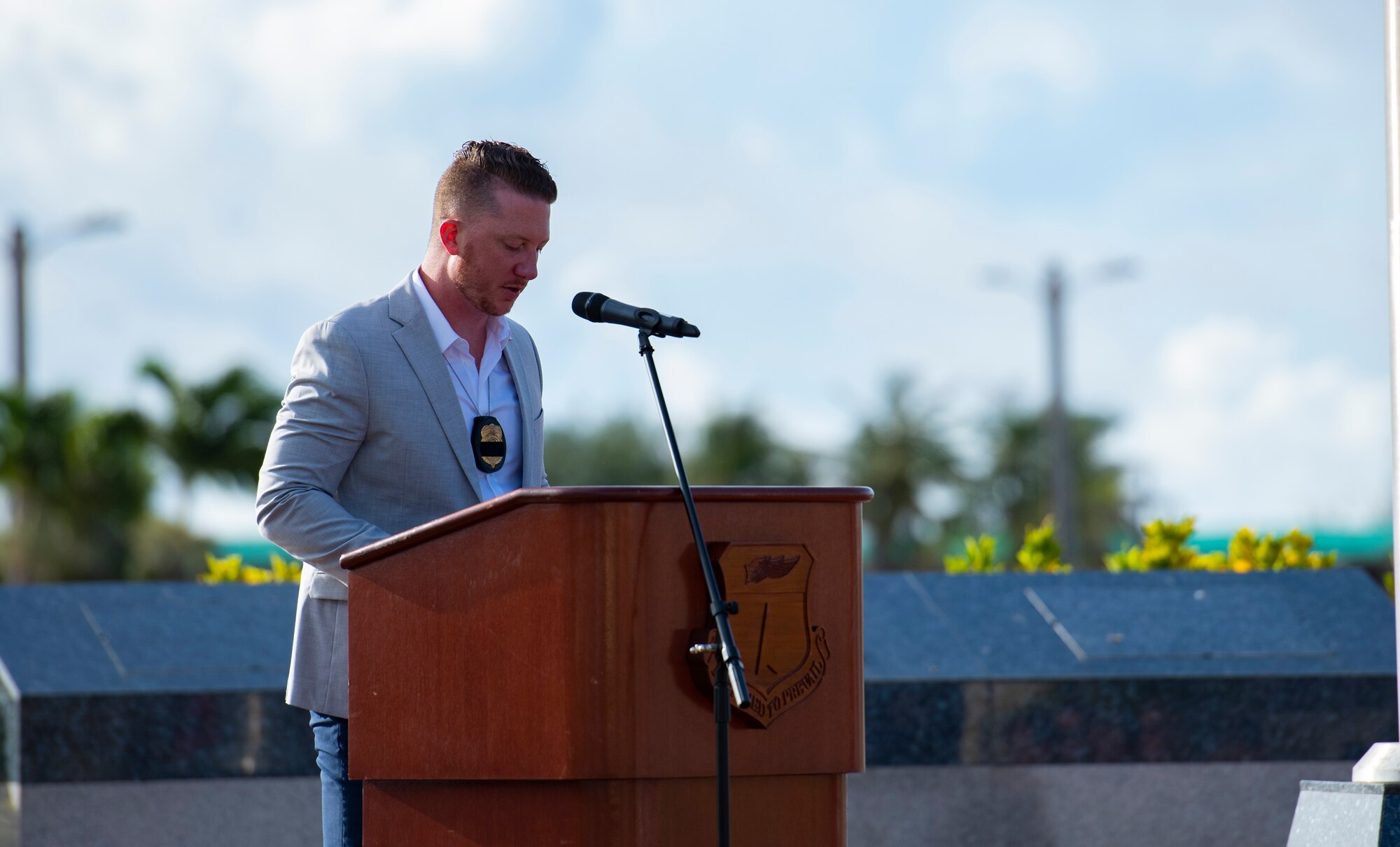 Special Agent Daniel Scarola, Department of the Air Force Office of Special Investigations, delivers remarks during an opening memorial ceremony for National Police Week May 16, 2022, at Andersen Air Force Base, Guam. National Police Week offers honor, remembrance and peer support while allowing law enforcement survivors and citizens to gather and pay homage to those who gave their life in the line of duty.(U.S. Air Force Photo by Senior Airman Helena Owens)