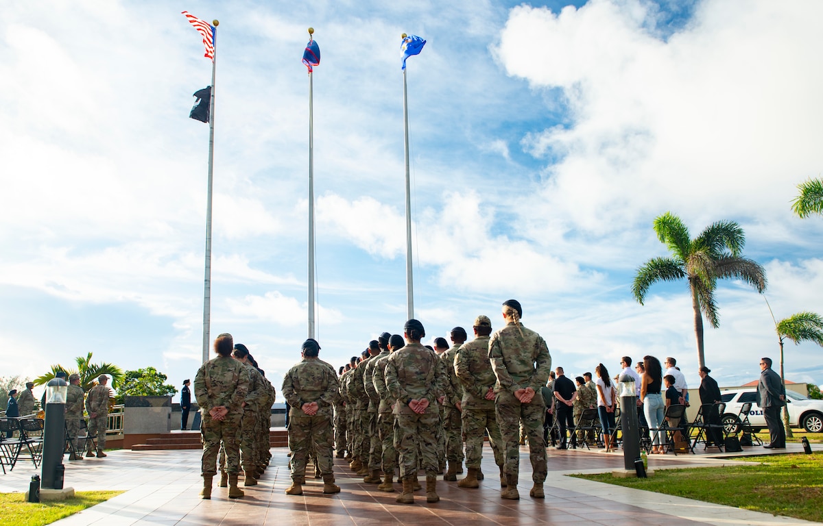 Defenders from the 36th Security Forces Squadron stand in formation during an opening memorial ceremony for National Police Week May 16, 2022, at Andersen Air Force Base, Guam. National Police Week offers honor, remembrance and peer support while allowing law enforcement survivors and citizens to gather and pay homage to those who gave their life in the line of duty. (U.S. Air Force Photo by Senior Airman Helena Owens)