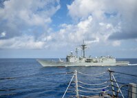 The Spanish Santa Maria-class frigate Numancia (F 83) pulls alongside the Arleigh Burke-class guided-missile destroyer USS Bainbridge (DDG 96).