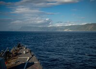 The Arleigh Burke-class guided-missile destroyer USS Bainbridge (DDG 96) transits the Strait of Messina. Bainbridge is underway as part of the Abraham Lincoln Carrier Strike Group (ABECSG) deployment in support of maritime security cooperation efforts in the U.S. Sixth Fleet areas of operation.