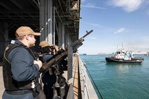 220514-N-TI693-1028

CIVITAVECCHIA, Italy (May 14, 2022) - Aviation Ordnanceman 2nd Class Alec Saucedo, front, from San Antonio, and Gunner's Mate 3rd Class Kylynn Lamar, stand watch at an M240 B machine gun mount during a sea and anchor evolution while getting underway from Civitavecchia, Italy, aboard the Expeditionary Sea Base USS Hershel "Woody" Williams (ESB 4), May 14, 2022. Hershel "Woody" Williams is on a scheduled deployment in the U.S. Sixth Fleet area of operations in support of U.S. national interests and security in Europe and Africa. (U.S. Navy photo by Mass Communication Specialist 1st Class Fred Gray IV/Released)