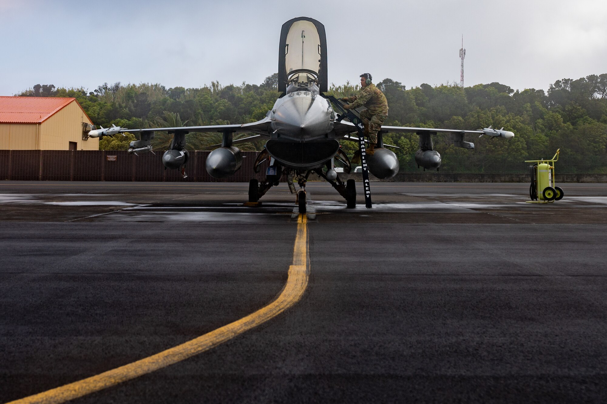 An Airman prepares an F-16 for launch.