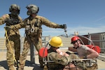 The Wisconsin Chemical Biological Radiological Nuclear Enhanced Response Force Package practiced crisis response with civilian partners May 14, 2022, at the Fox Valley Technical College, Public Safety Training Center, Appleton, Wisconsin. The exercise included setting up a medical field site, searching and rescuing casualties and hoisting them via helicopter for treatment.