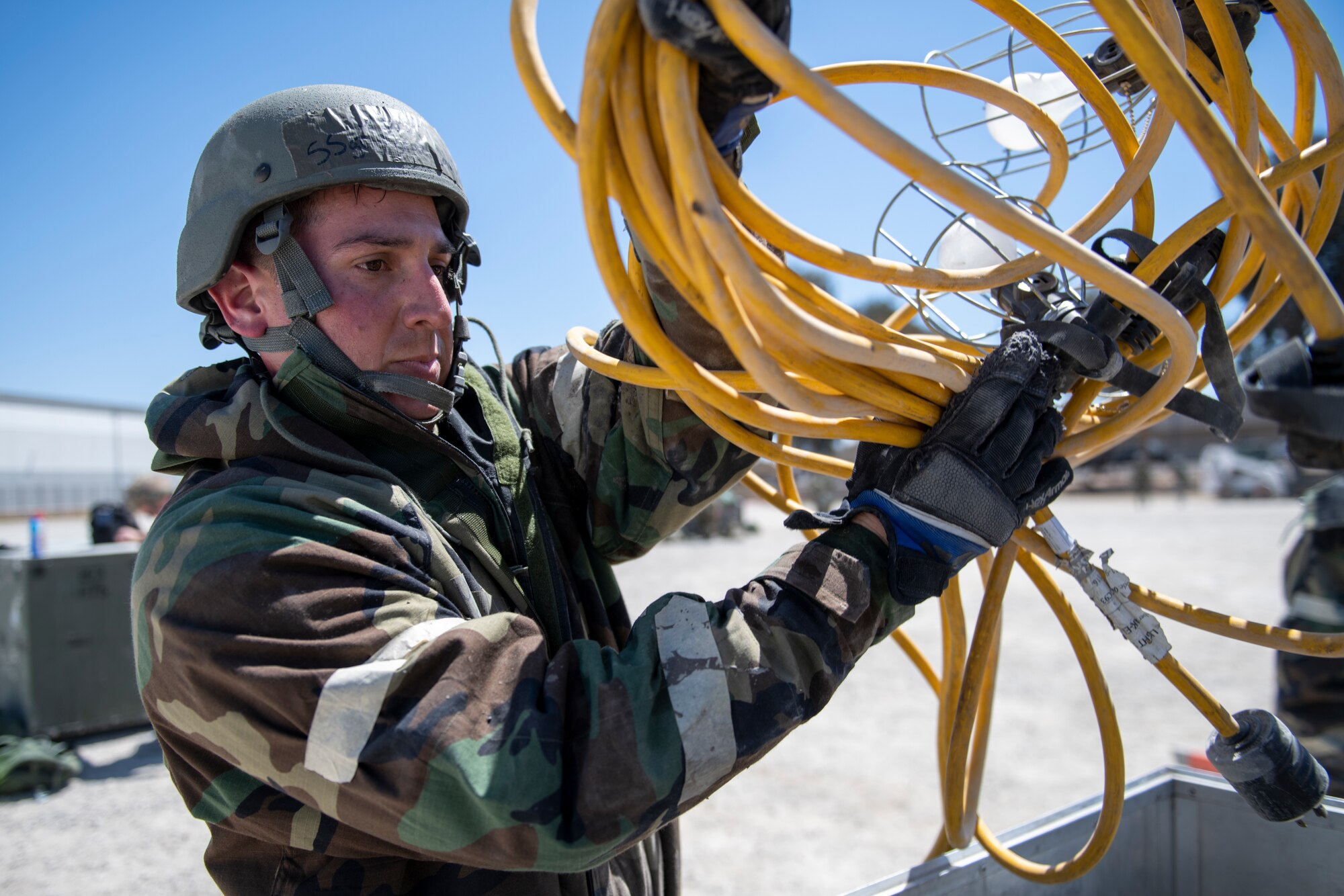 Airmen of the 163d Civil Engineer Squadron, California Air National Guard, tear down tents and store equipment during exercise Grizzly Thunder 22-3 at March Air Reserve Base, California, May 14, 2022. Grizzly Thunder was a continuation of a deployment training exercise from late 2021, dubbed Grizzly Lightning.