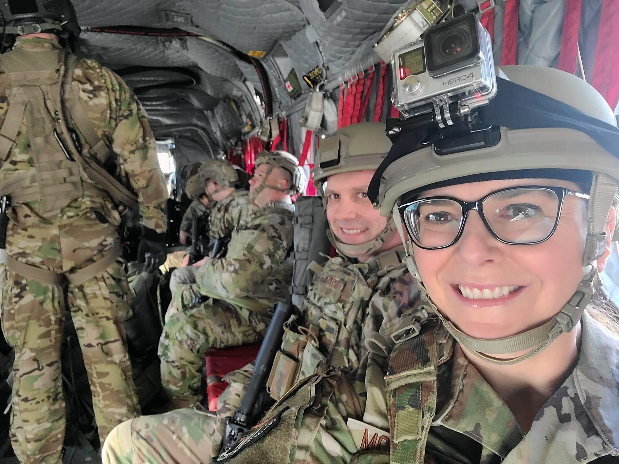 Chief Master Sgt. Jennifer McKendree, the 910th Airlift Wing command chief, poses for a selfie on a CH-47 Chinook helicopter while preparing to fly to Camp James A. Garfield Joint Military Training Center, Ohio, with members of the 910th Security Forces Squadron at Youngstown Air Reserve Station, Ohio, March 31, 2022.