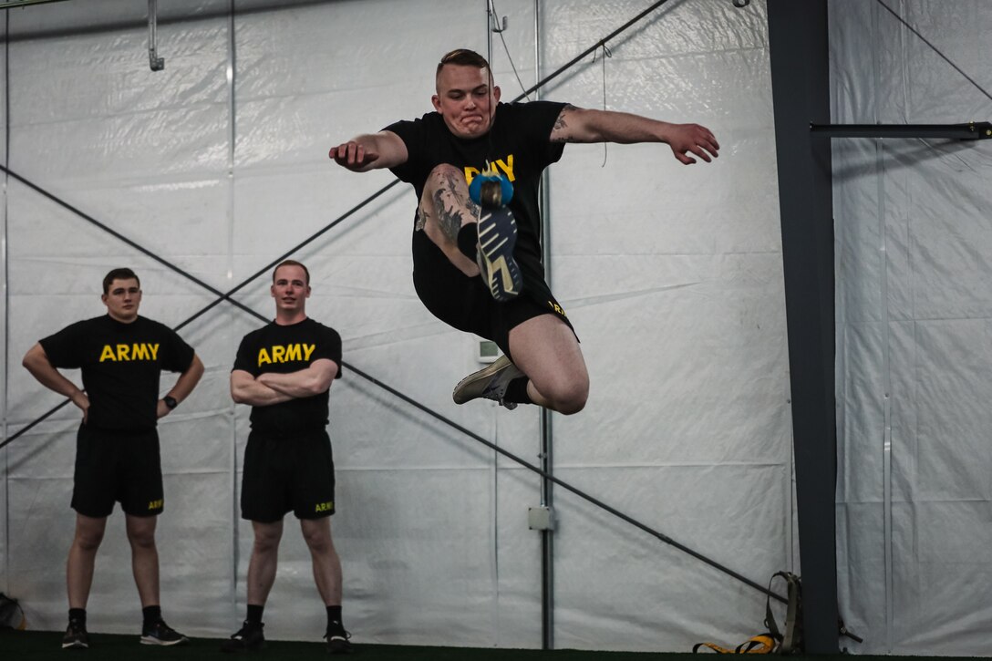 Sgt. Jeseb Mogen, a military police Soldier assigned to Company A, 49th Missile Defense Battalion, attempts the One-Foot High Kick during the mystery event for the Best Warrior Competition held at Joint Base Elmendorf-Richardson, Alaska, May 13, 2022. The mystery event chosen for this year’s competition pays homage to Alaska’s Native American culture by having the Soldiers attempt three sports from the Native Youth Olympics. (U.S. Army National Guard photo by Pvt. Caleb Lawhorne)