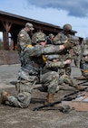 Alaska Army National Guardsman Spc. Mark Adair with the 207th Engineer Utilities Detachment, fires a M17 handgun during marksmanship event as a part of the Alaska Army National Guard Best Warrior Competition on Joint Base Elmendorf-Richardson, AK, May 14, 2022. The Best Warrior Competition recognizes Soldiers who demonstrate commitment to the Army values and embody the warrior ethos. (U.S. Army National Guard photo by Spc. Marc Marmeto).