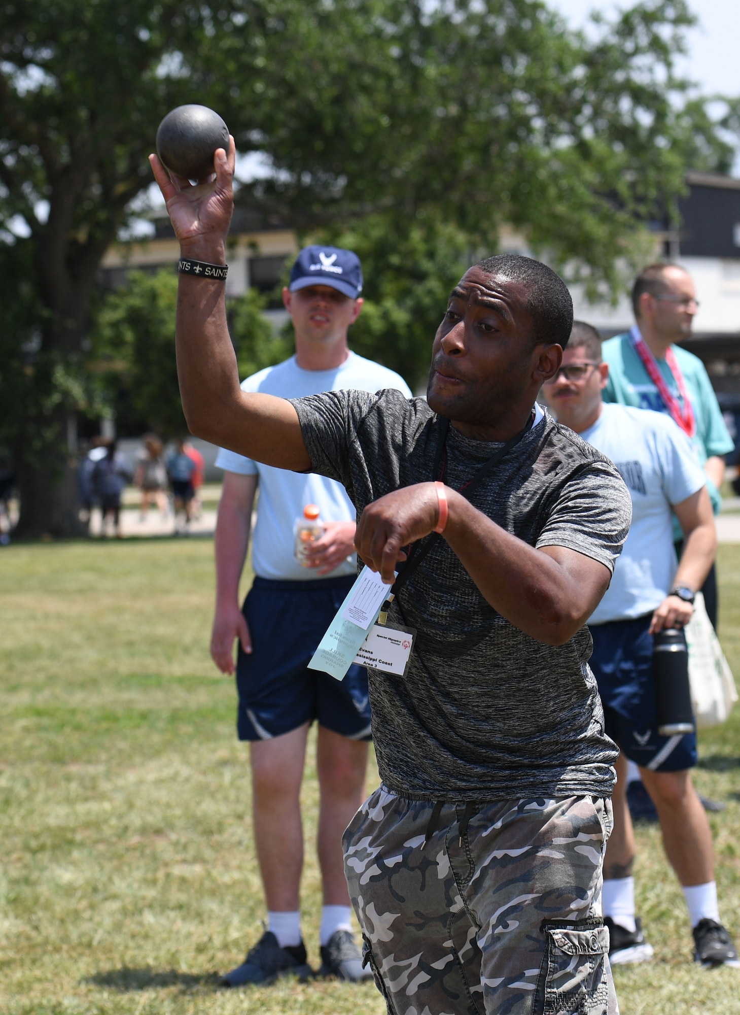 Miguel Evans, Area 3 athlete, participates in shot put during the Special Olympics Mississippi Summer Games at Keesler Air Force Base, Miss., May 14, 2022. Over 600 athletes participated in the Summer Games. (U.S. Air Force photo by Kemberly Groue)
