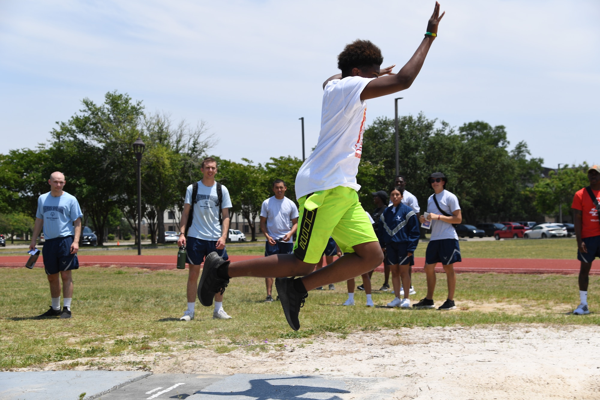 Jontavious Allen, Area 15 athlete, participates in running long jump during the Special Olympics Mississippi Summer Games at Keesler Air Force Base, Miss., May 14, 2022. Over 600 athletes participated in the Summer Games. (U.S. Air Force photo by Kemberly Groue)