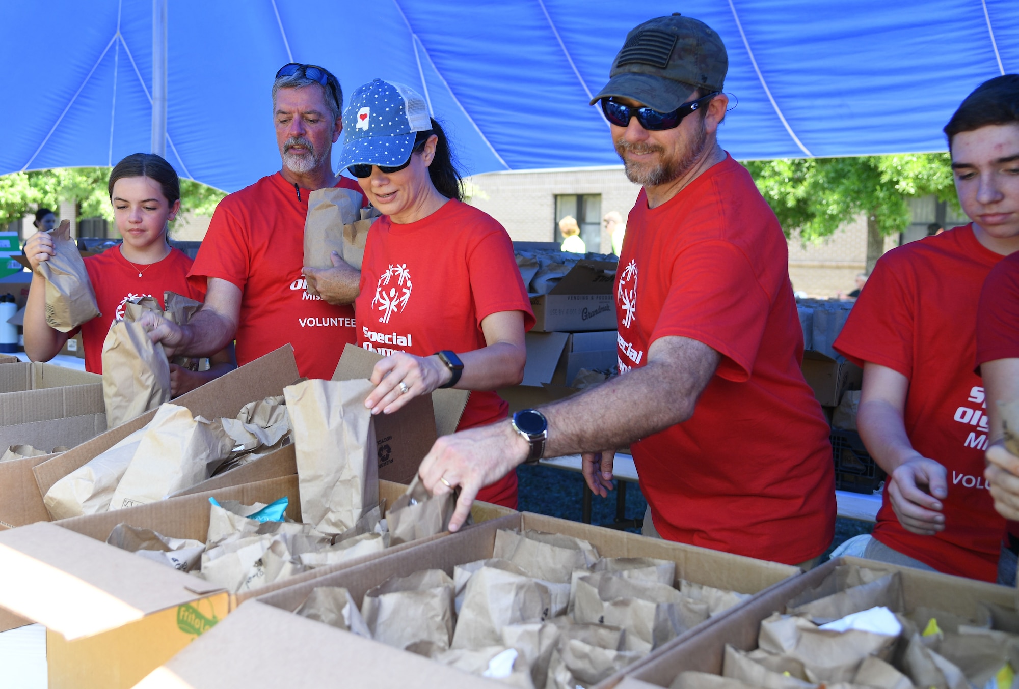 Keesler personnel volunteer during the Special Olympics Mississippi Summer Games at Keesler Air Force Base, Miss., May 14, 2022. Over 600 athletes participated in the Summer Games. (U.S. Air Force photo by Kemberly Groue)