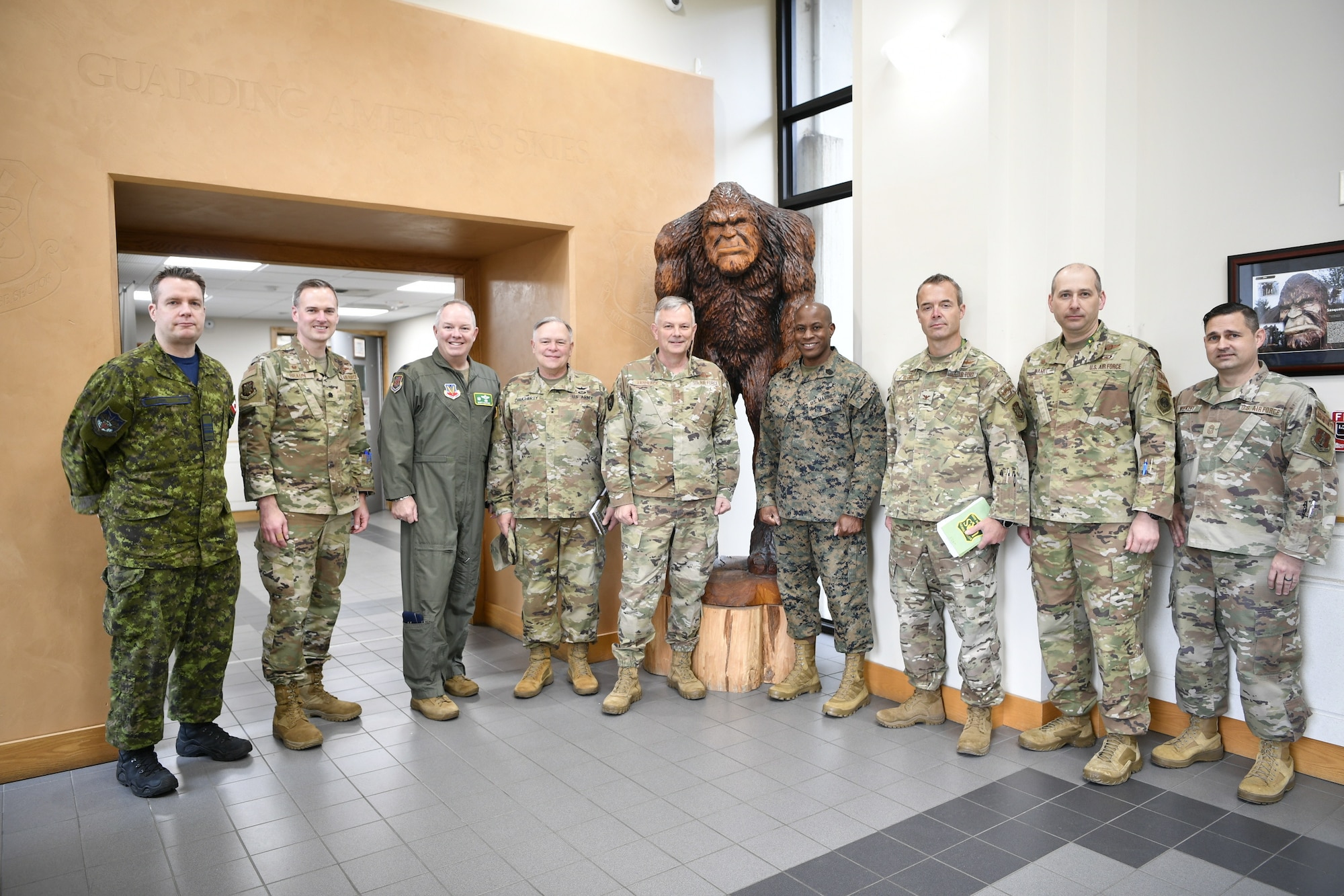 group photo in front of Bigfoot statue