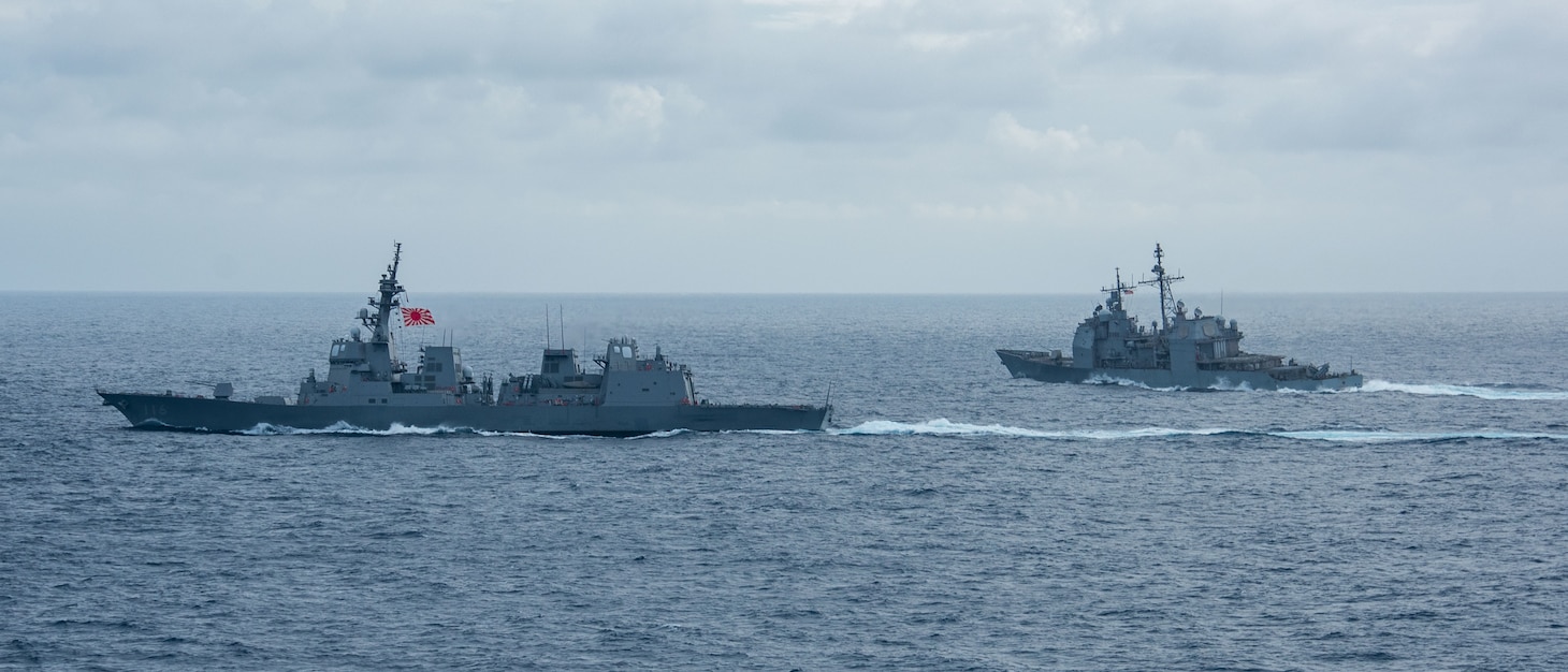220512-N-BR419-2182 PHILIPPINE SEA (May 12, 2022) Japan Maritime Self-Defense Force (JMSDF) destroyer JS Teruzuki (DD-116), left, and Ticonderoga-class guided-missile cruiser USS Antietam (CG 54) steam in formation with the U.S. Navy’s only forward-deployed aircraft carrier USS Ronald Reagan (CVN 76), during a bilateral exercise. The U.S. Navy and JMSDF routinely conduct naval exercises together, strengthening the U.S.-Japan alliance and maintaining a free and open Indo-Pacific region. Ronald Reagan, the flagship of Carrier Strike Group 5, provides a combat-ready force that protects and defends the United States, and supports alliances, partnerships and collective maritime interests in the Indo-Pacific region. (U.S. Navy photo by Mass Communication Specialist 3rd Class Oswald Felix Jr.)