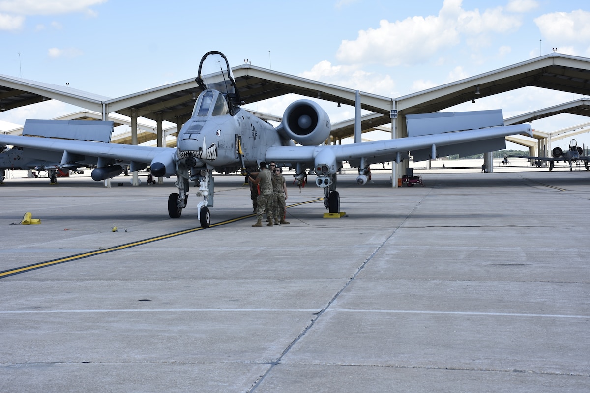 Maintainers from the 442d Maintenance Group conduct post-flight inspections on the A-10 Thunderbolt II