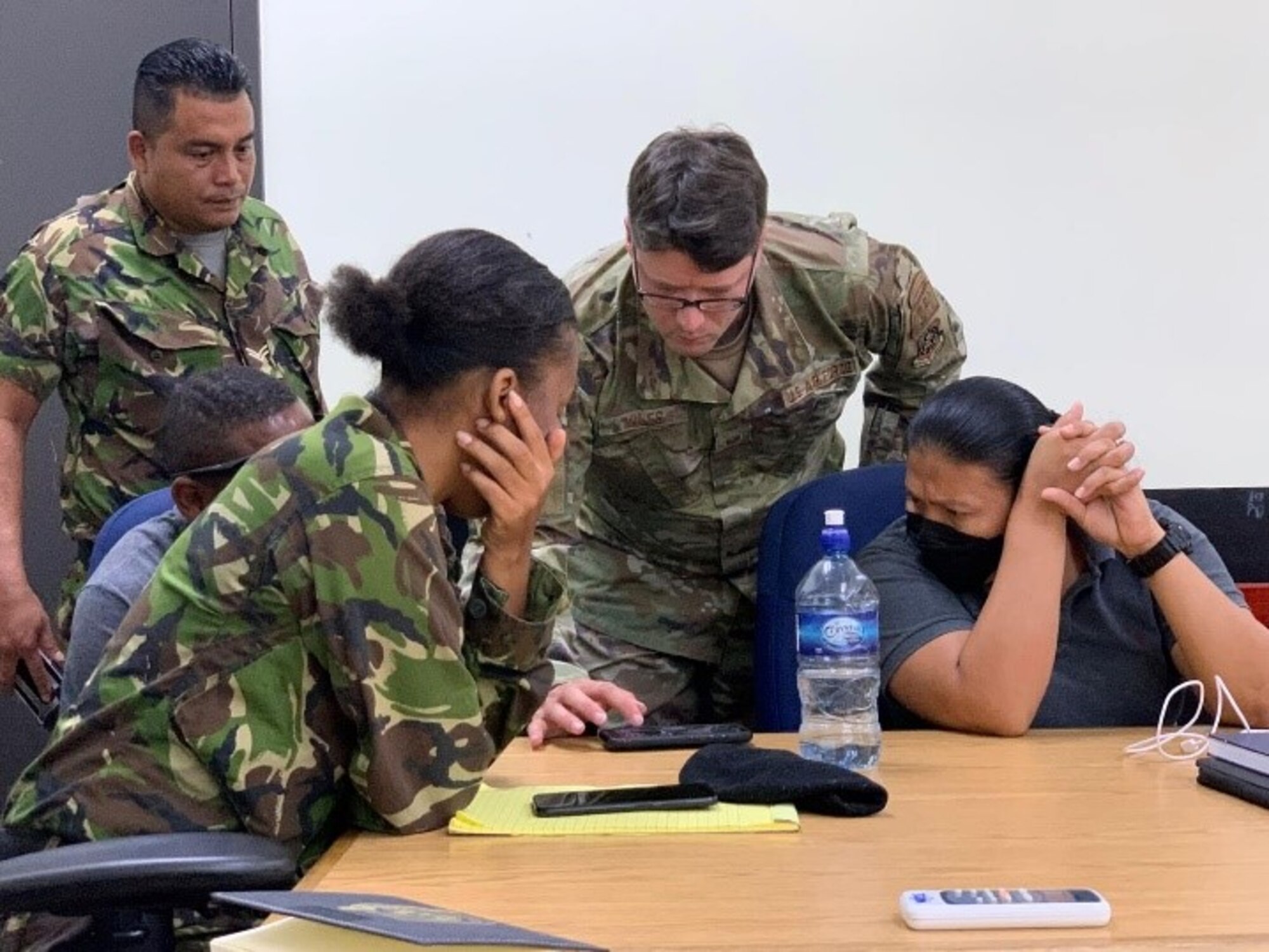 A U.S. Air Force member assigned to the 571st Mobility Support Advisory Squadron conducts joint operations training with the Belizean Coast Guard, Defence Force and local police at Belize Defence Force Base, Belize City, Belize, March 29-30. During the training exercise, Air Force members demonstrated Airborne Extensible Relay Over-Horizon Network, also known as the AERONet system, which is an affordable and commercially secure combat system capable of providing video, voice, chat and position data to partner nations. (Courtesy photo)