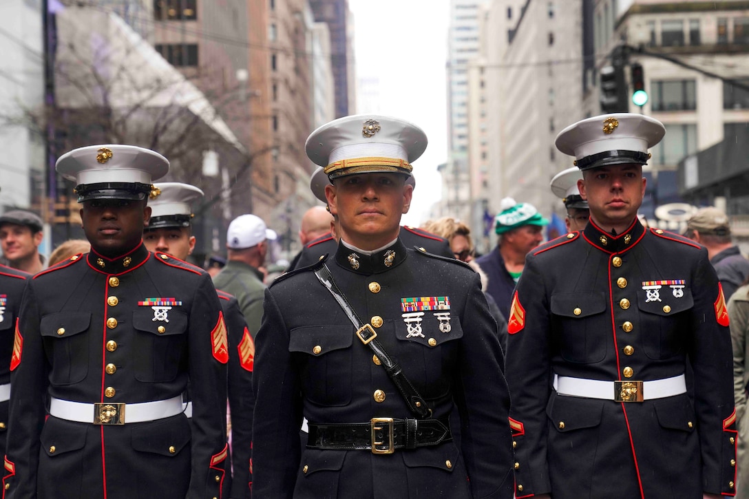 U.S. Marine Capt. Frank Cinturati, center, special projects officer for 1st Marine Corps District, leads a marching detail during the annual New York City St. Patrick's Day Parade in New York, Mar. 17, 2022. (U.S. Marine Corps photo by Sgt. Tojyea G. Matally)