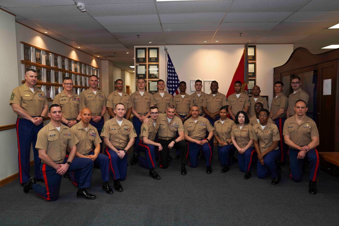 U.S. Marine Maj. Gen. Bohm, the commanding general of Marine Corps Recruiting Command, poses for a photo with Marines of 1st Marine Corps District Headquarters, at 1st Marine Corps District, Garden City, New York, April 21, 2022. (U.S. Marine Corps by Sgt. Tojyea G. Matally)