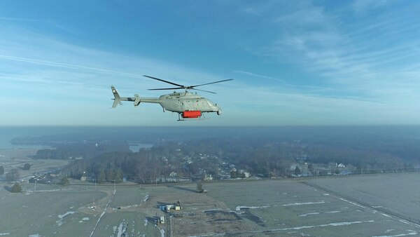 The MQ-8 Fire Scout, with mass shapes attached, conducts low airspeed flying qualities testing in February at Webster Field, Maryland, to prepare for upcoming the Single System Multi-Mission Airborne Mine Detection (SMAMD) demonstration