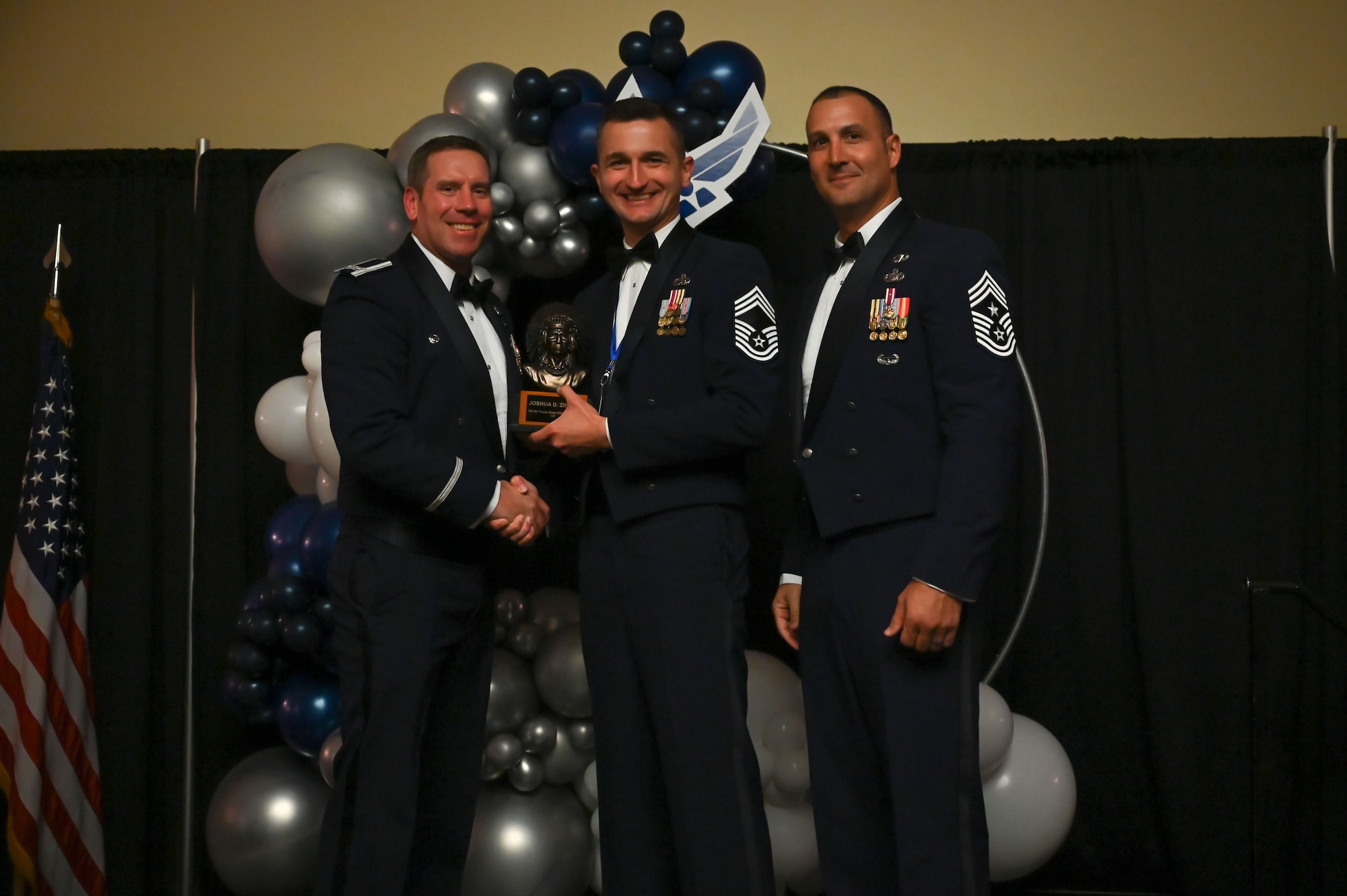 Chief Master Sgt. Joshua Ziriak (center), 388th Logistics Support Squadron, poses with Col. Craig Andrle (left), 388th Fighter Wing commander, and Chief Master Sgt. Brandon Wolfgang, 388th FW command chief.