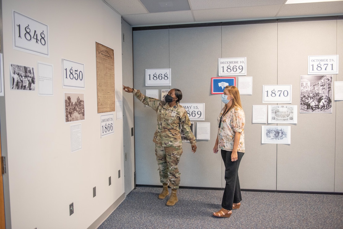 MSG Shantae Allen give a tour of the U.S. Army Corps of Engineers Transatlantic Middle East District Women’s History Month Display in March, 2020.