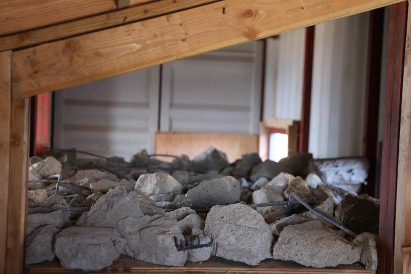 Concrete debris in an enclosed structure simulating a collapsed building