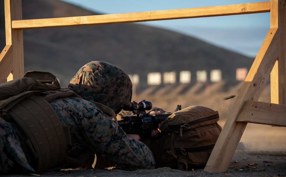 A U.S. Marine sights in M4 carbine before conducting his annual rifle qualification at Range 116A on Marine Corps Base Camp Pendleton, California, May 11, 2022. Camp Pendleton’s Marksmanship Training Division trains 22,000 Marines and sailors each year across the installation to effectively engage targets with both rifles and pistols. The ARQ is a timed course of fire, ranging from 500 yards down to 15 yards. (U.S. Marine Corps photo by Cpl. Benjamin Whitehurst)