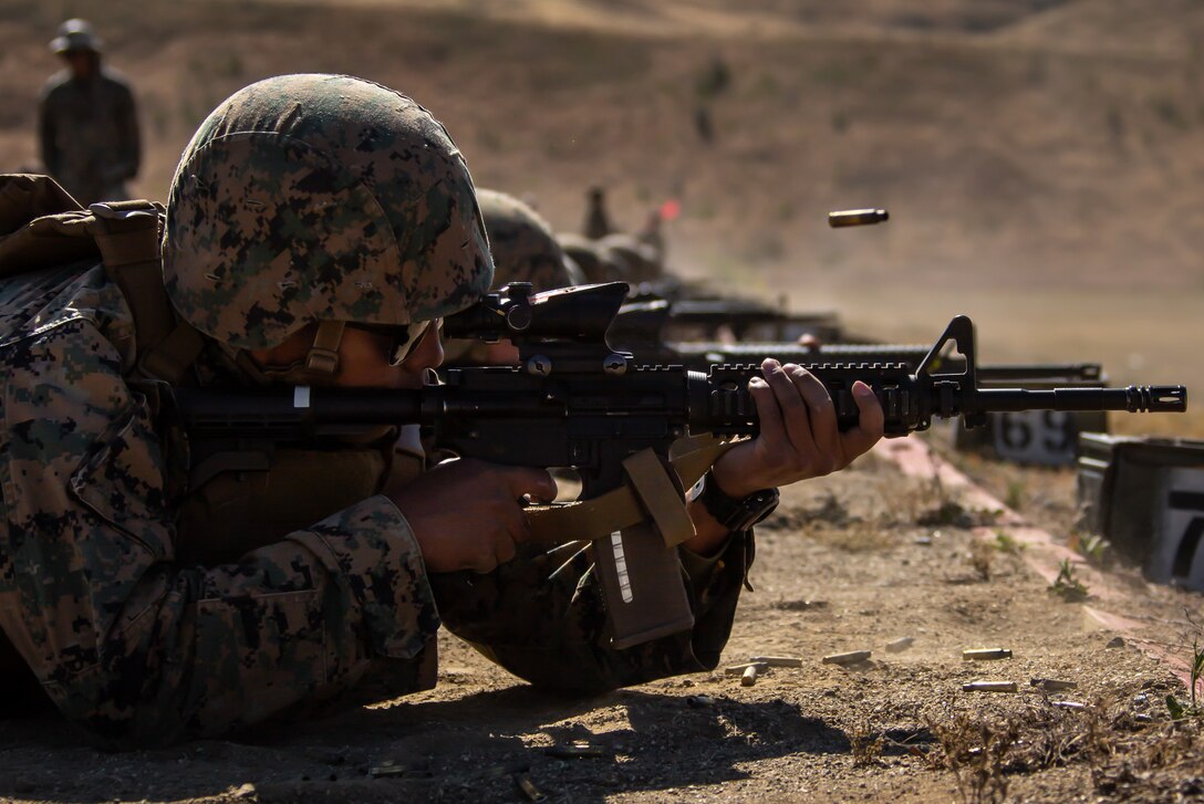 A U.S. Marine conducts his annual rifle qualification at Range 116A, on Marine Corps Base Camp Pendleton, California, May 11, 2022. Camp Pendleton’s Marksmanship Training Division trains 22,000 Marines and sailors each year across the installation to effectively engage targets with both rifles and pistols. The ARQ is a timed course of fire, ranging from 500 yards down to 15 yards. (U.S. Marine Corps photo by Cpl. Benjamin Whitehurst)