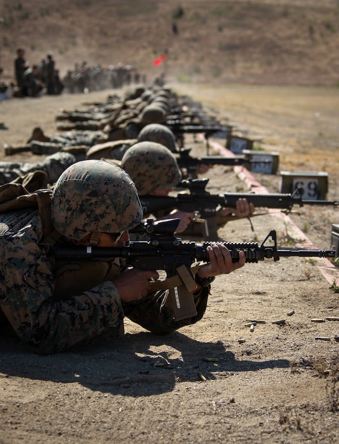 U.S. Marines engage targets from the prone position during their annual rifle qualification at Range 116A on Marine Corps Base Camp Pendleton, California, May 11, 2022. Camp Pendleton’s Marksmanship Training Division trains 22,000 Marines and sailors each year across the installation to effectively engage targets with both rifles and pistols. The ARQ is a timed course of fire, ranging from 500 yards down to 15 yards. (U.S. Marine Corps photo by Cpl. Benjamin Whitehurst)