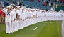 U.S. Navy Sailors assigned to commands in the Naval District Washington region, man the rails during the national anthem prior to a baseball game at Nationals Park in Washington, May 10, 2022.