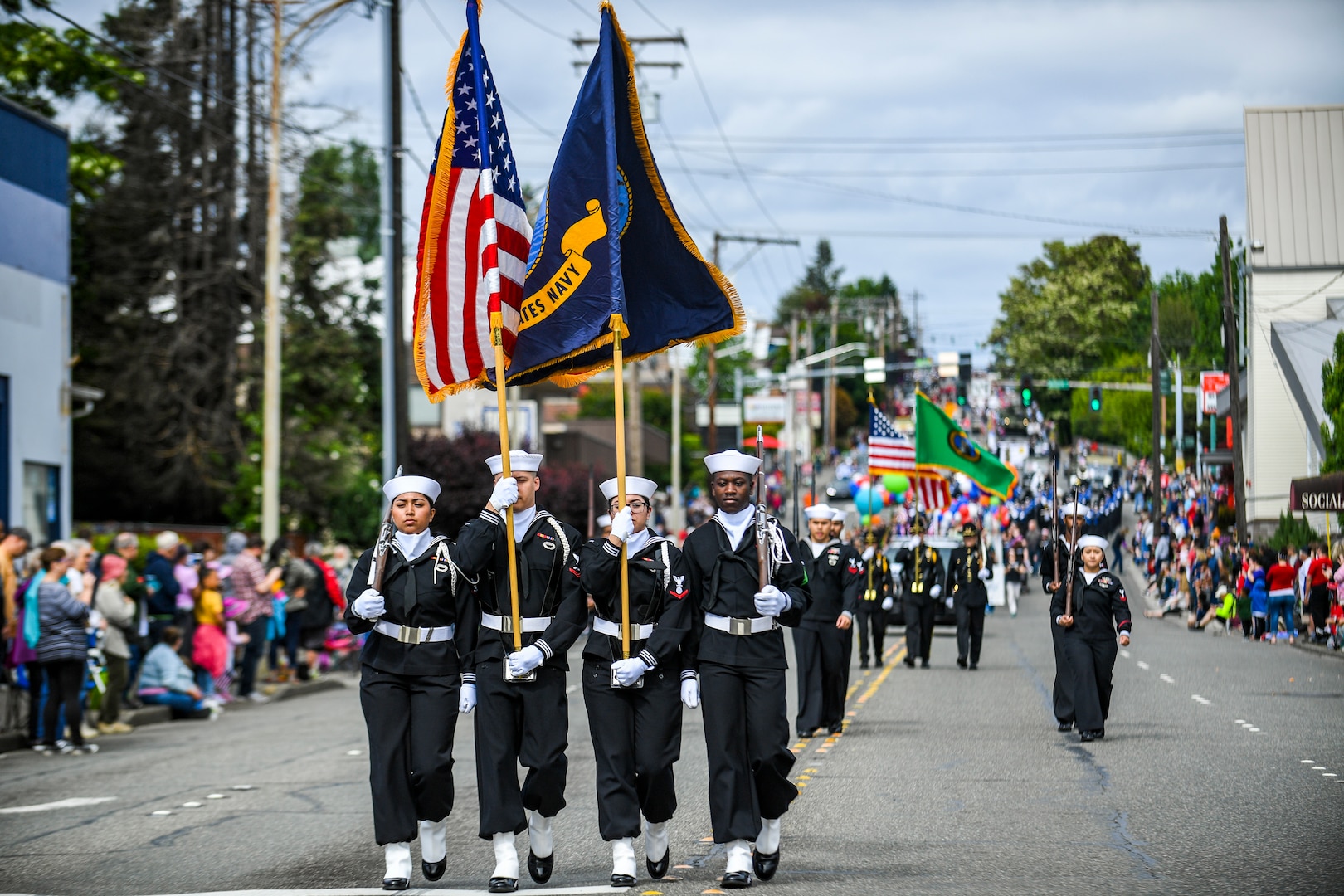 (May 18, 2019) - Aircraft carrier USS Nimitz's (CVN 68) Honor Guard leads the participants of the 72nd Kitsap Credit Union Armed Forces Day Parade down 6th Street. The Kitsap Credit Union Armed Forces Day Parade, held on the third Saturday in May in downtown Bremerton, has an annual attendance of 25,000-40,000 people and includes all branches of the military, police and firefighters, youth organizations, dignitaries, commercial businesses, car clubs and more. (U.S. Navy photo by Mass Communication Specialist 2nd Class Wyatt L. Anthony)