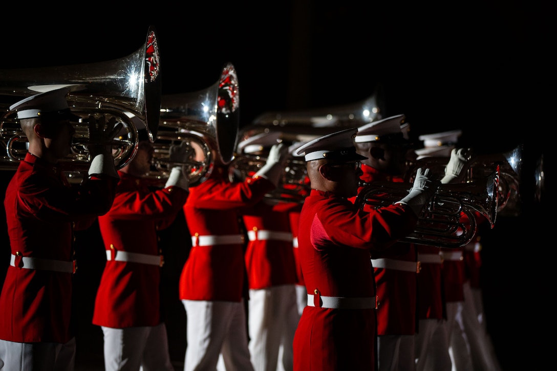 Marines with “The Commandant’s Own,” U.S. Marine Drum and Bugle Corps, march during  a Friday Evening Parade at Marine Barracks Washington, D.C.