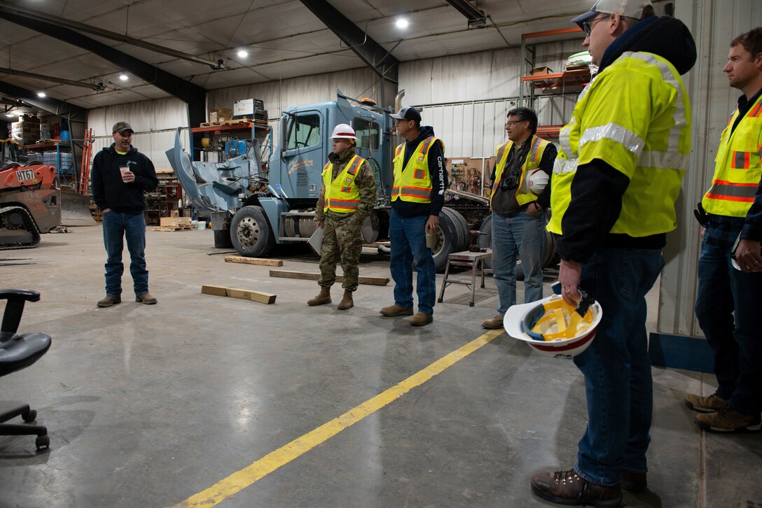 Members of the U.S. Army Corps of Engineers Omaha District attend a safety briefing before going on site at Hamburg, Iowa, 24 Apr. 2022.