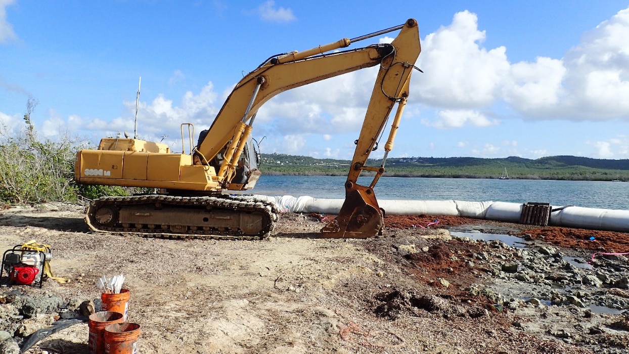 Removal of underwater munitions by remote-controlled excavator and temporary cofferdam at Vieques, Puerto Rico.