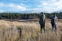 PORT HADLOCK, Wash. (Dec. 13, 2019) Admiralty Audubon Society member John Church, left, and Naval Magazine Indian Island Biologist Bill Kalina, right, spot coyotes during the conservation society’s annual Christmas Bird Count. The Admiralty Audubon Society, a National Audubon Society chapter formed in 1978, serves Port Townsend and the communities of eastern Jefferson County, Washington. (U.S. Navy photo by Mass Communication Specialist 3rd Class Emilia Hilliard)