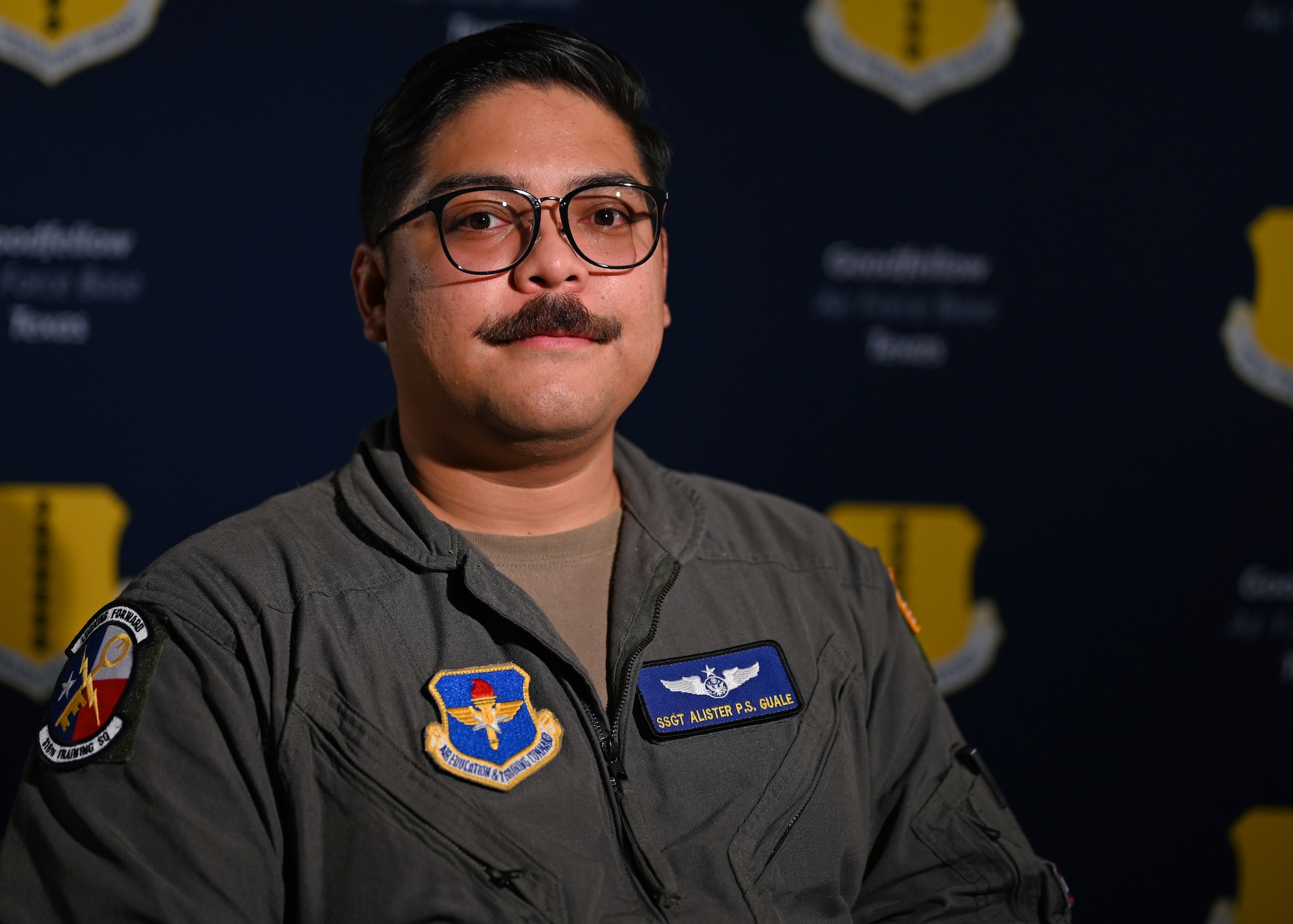 U.S. Air Force Staff Sgt. Alister Guale, 316th Training Squadron Chinese linguist instructor, poses for a photo at Goodfellow Air Force Base, Texas, May 16, 2022. Guale is half Filipino and shared his culture through food and compassion. (U.S. Air Force photo by Senior Airman Ethan Sherwood)