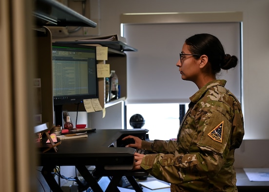 Staff Sgt. Cristina Garza, 30th Comptroller Squadron financial analyst, works on her computer at Vandenberg Space Force Base, Calif., April 19, 2022. (U.S. Space Force photo by Airman 1st Class Tiarra Sibley)