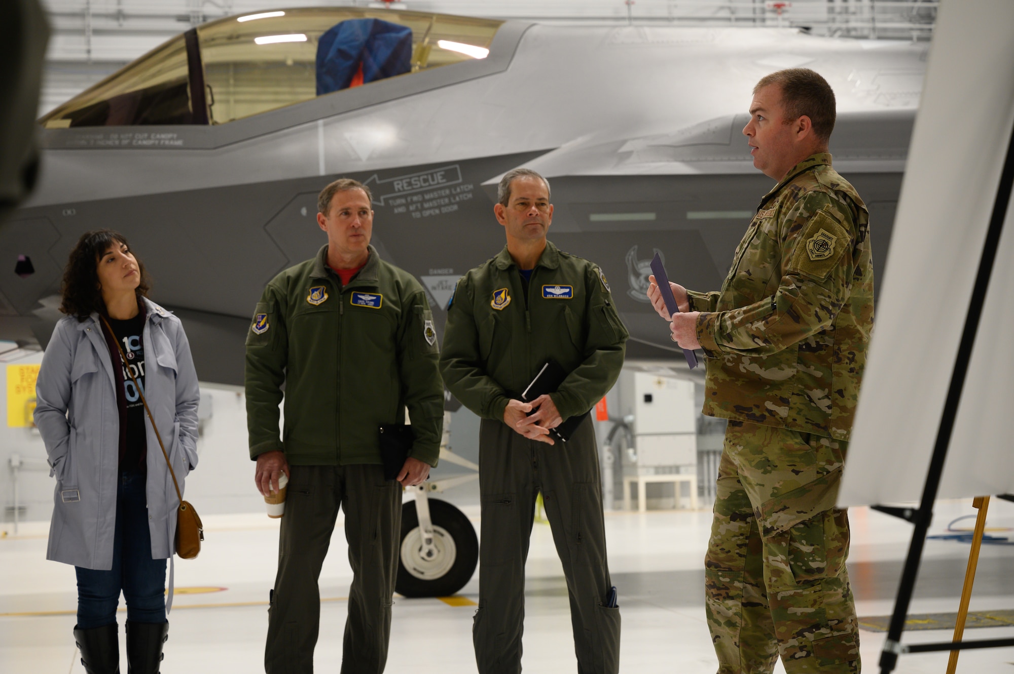 U.S. Air Force Lt. Col. Joseph Langan, the 354th Aircraft Maintenance Squadron commander (right), briefs distinguished visitors May 13, 2022, on Eielson Air Force Base, Alaska.