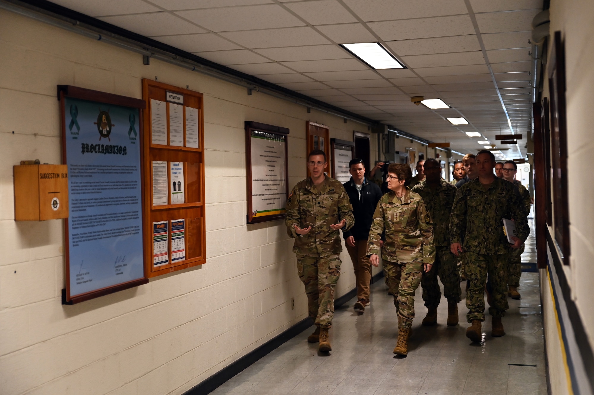 U.S. Army Lt. Col. Jamison Smith, 599th Transportation Brigade commander, briefs U.S. Air Force Gen. Jacqueline D. Van Ovost, commander, U.S. Transportation Command (USTRANSCOM), while touring the 837th Transportation Battalion May 17, 2022, Pier 8, Busan, Republic of Korea. Every operation the Joint Force participates in starts and ends with USTRANSCOM. (U.S. Air Force photo by Master Sgt. Rachelle Morris)