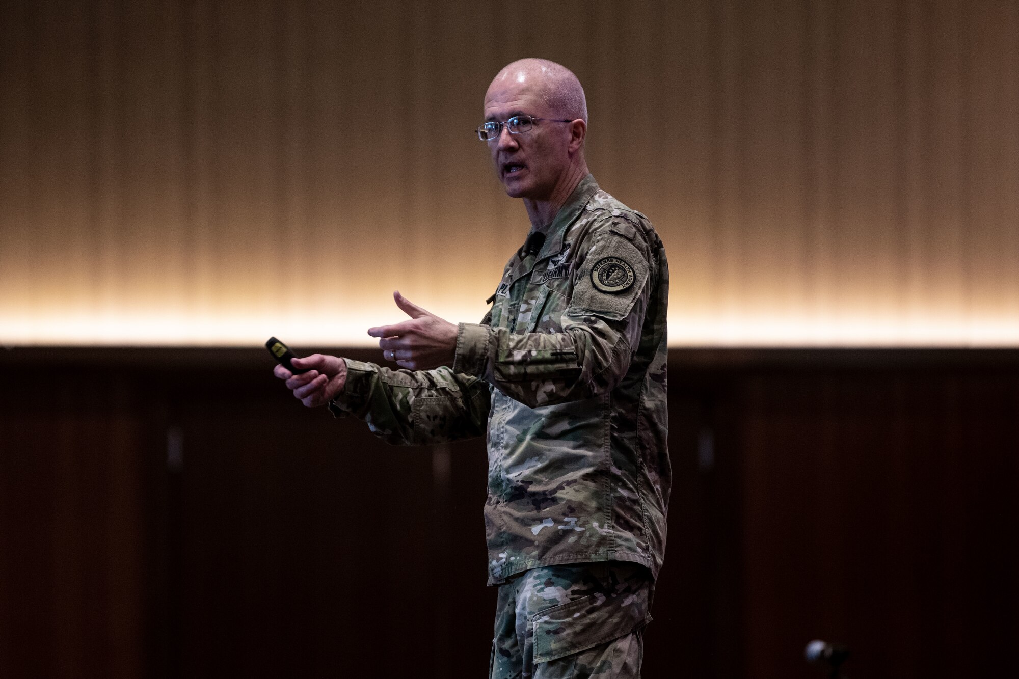 Soldier speaks to an audience.