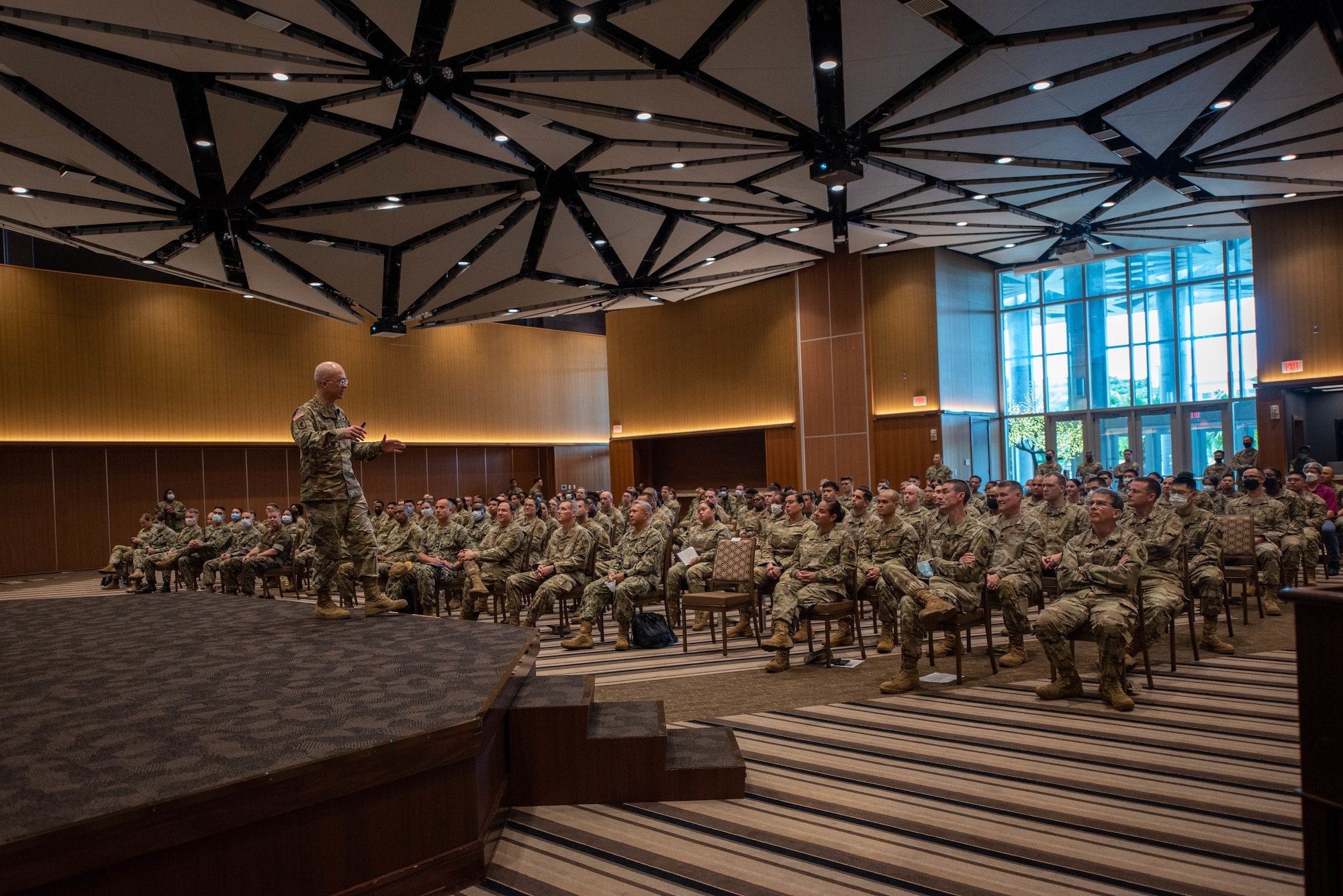 Soldier speaks to an audience.