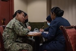 220517-N-ZA692-1054 MANAMA, Bahrain (May 17, 2022) Women from the U.S. Navy and Bahrain’s Ministry of Interior speak during a leadership exchange at Naval Support Activity Bahrain, May 17. The engagement enabled uniformed women from both nations to share their experiences and enhance mutual understanding.