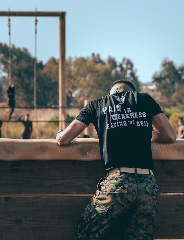 A U.S. Marine Corps officer candidate with Officer Selection Team Orange County, maneuvers an obstacle course during the Officer Candidates School preparation weekend at Edson Range, Camp Pendleton, California on April 30, 2022. The OCS preparation weekend is designed to prepare aspiring Marine Corps officers mentally and physically for the rigors of OCS. (U.S. Marine Corps photo by Cpl. Andrew Skiver)