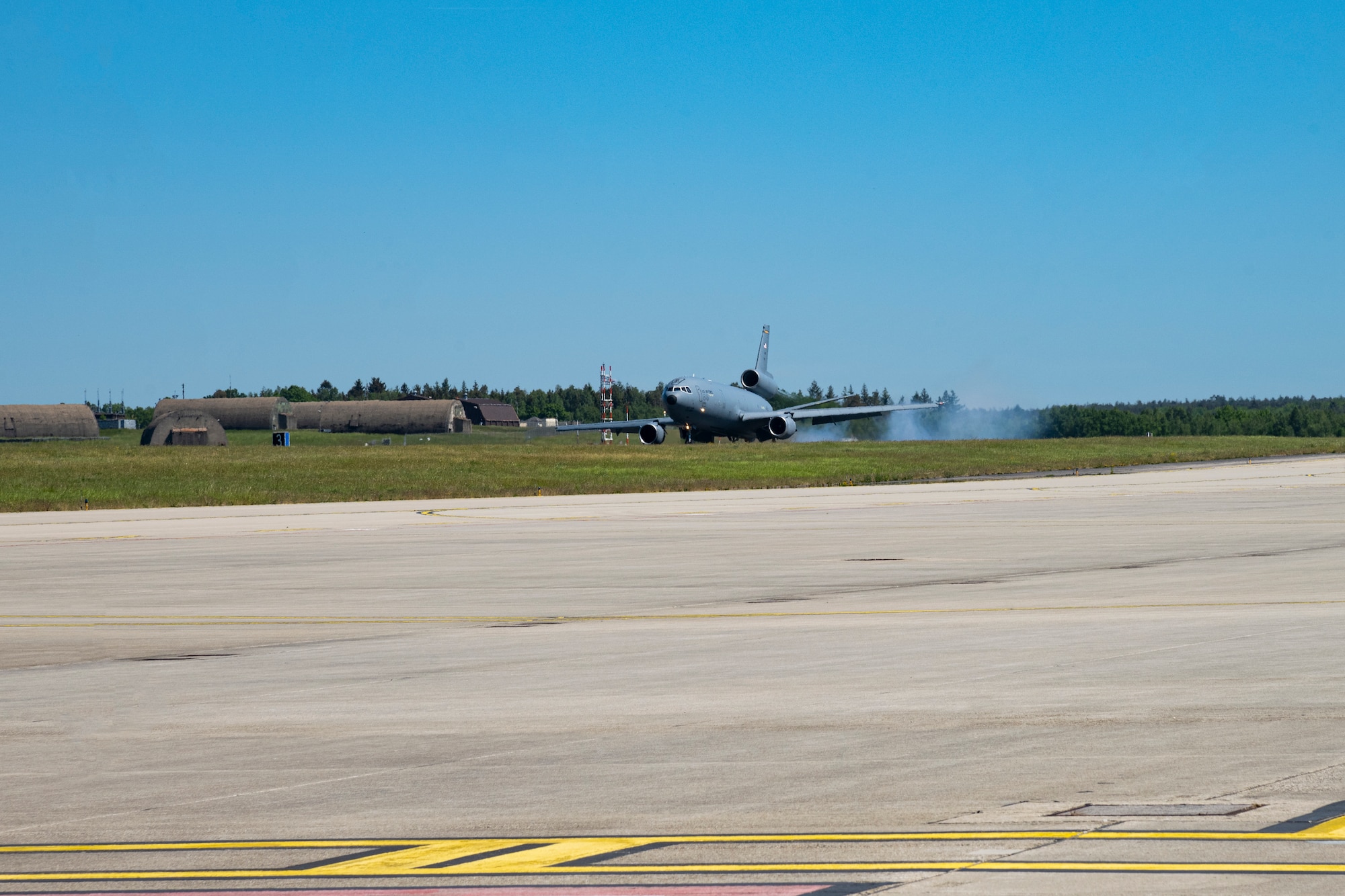 A KC-10 Extender aircraft assigned to the 305th Air Mobility Wing at Joint Base McGuire-Dix-Lakehurst, New Jersey, arrives at Spangdahlem Air Base, Germany, May 14, 2022. The 305th AMW generates, mobilizes and deploys C-17 Globemaster III and KC-10 Extender aircraft and are currently supporting operations within the European theater.  (U.S. Air Force photo by Senior Airman Ali Stewart)