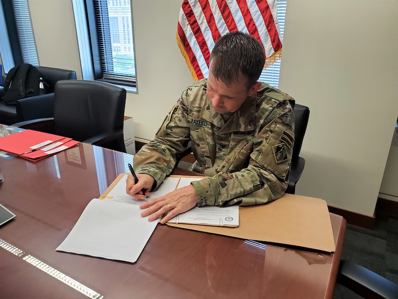 Col. Travis Rayfield, commander, Kansas City District, signed an agreement for aquatic restoration at Harlan County Lake, Nebraska, with the state of Nebraska, May 17, 2022.