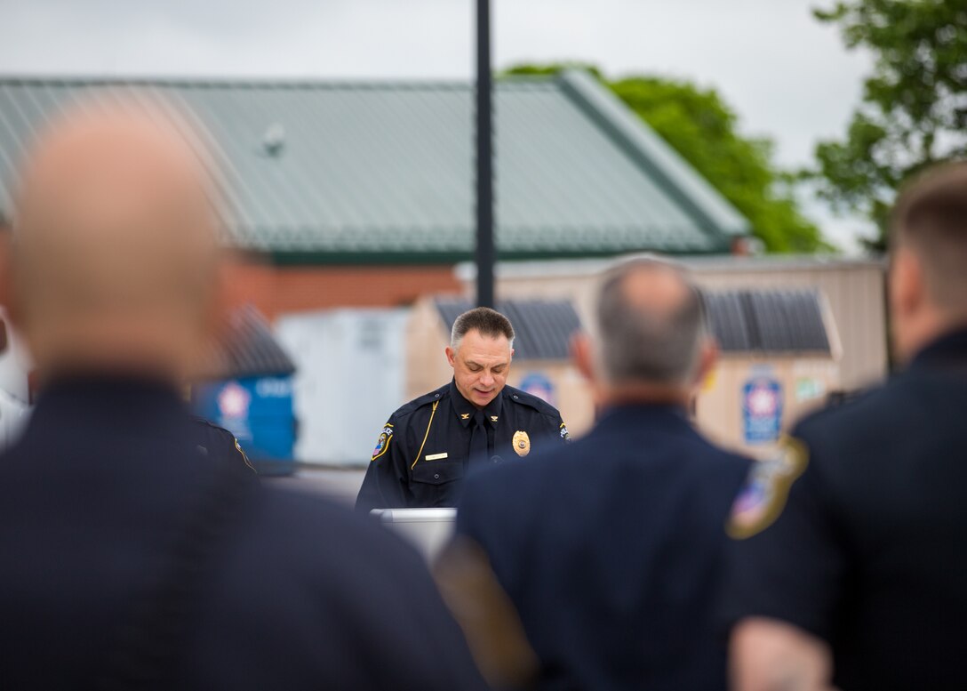 The DSCC police chief speaks in front of other police officers.