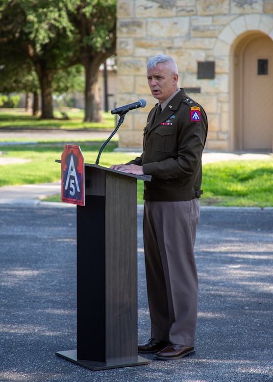 U.S. Army Maj. Gen. William Prendergast, U.S. Army North Contingency Command Post (Task Force 51) Commander, speaks during an event to honor U.S. Army World War II Veteran, Pfc. Reid F. Clanton, at the historic Quadrangle of Fort Sam Houston, Texas, May 16, 2022. U.S. Army North leaders paid special tribute to the service of Pfc. Reid F. Clanton during a ceremony awarding him long-overdue medals, which included the Bronze Star Medal at U.S. Army North headquarters, in the historic Quadrangle of Fort Sam Houston, Texas. (U.S. Army photo by Pfc. Gianna Elle Sulger)