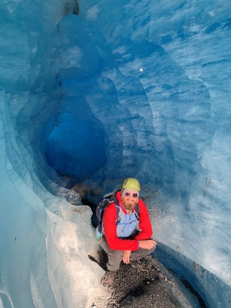 man in an ice cave